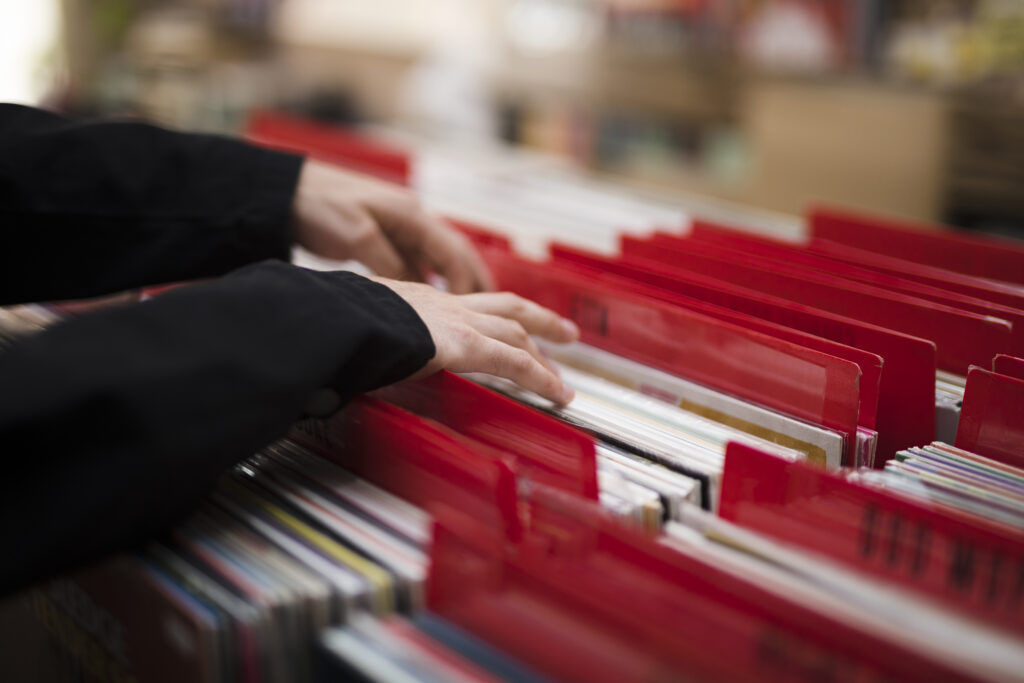 Man browsing records in a store